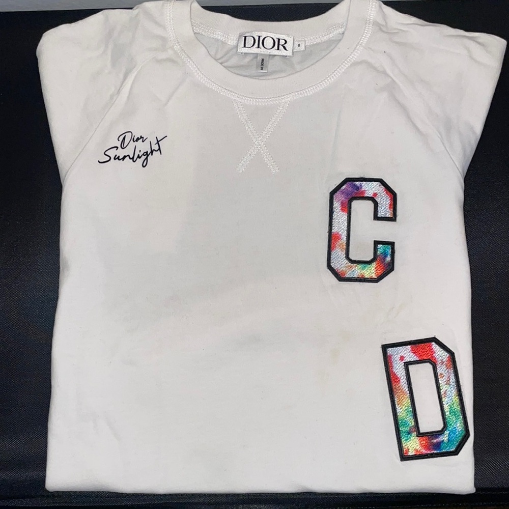 Lightly worn Christian Dior shirt. One small, stain (please see picture). Size 8
